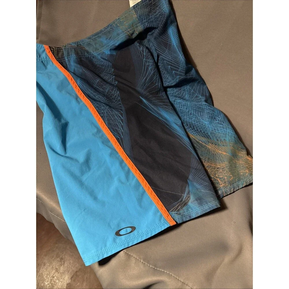 Oakley 32 Blue Board Shorts Zip Pocket Orange Regular Fit Swim Skull Y2K Print